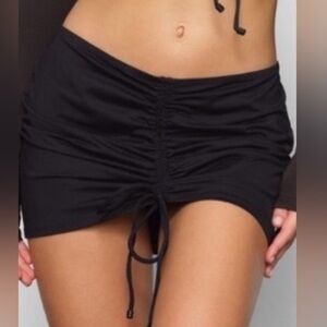 SKIMS Black Ruched Adjustable Tie Swim Mini Skirt